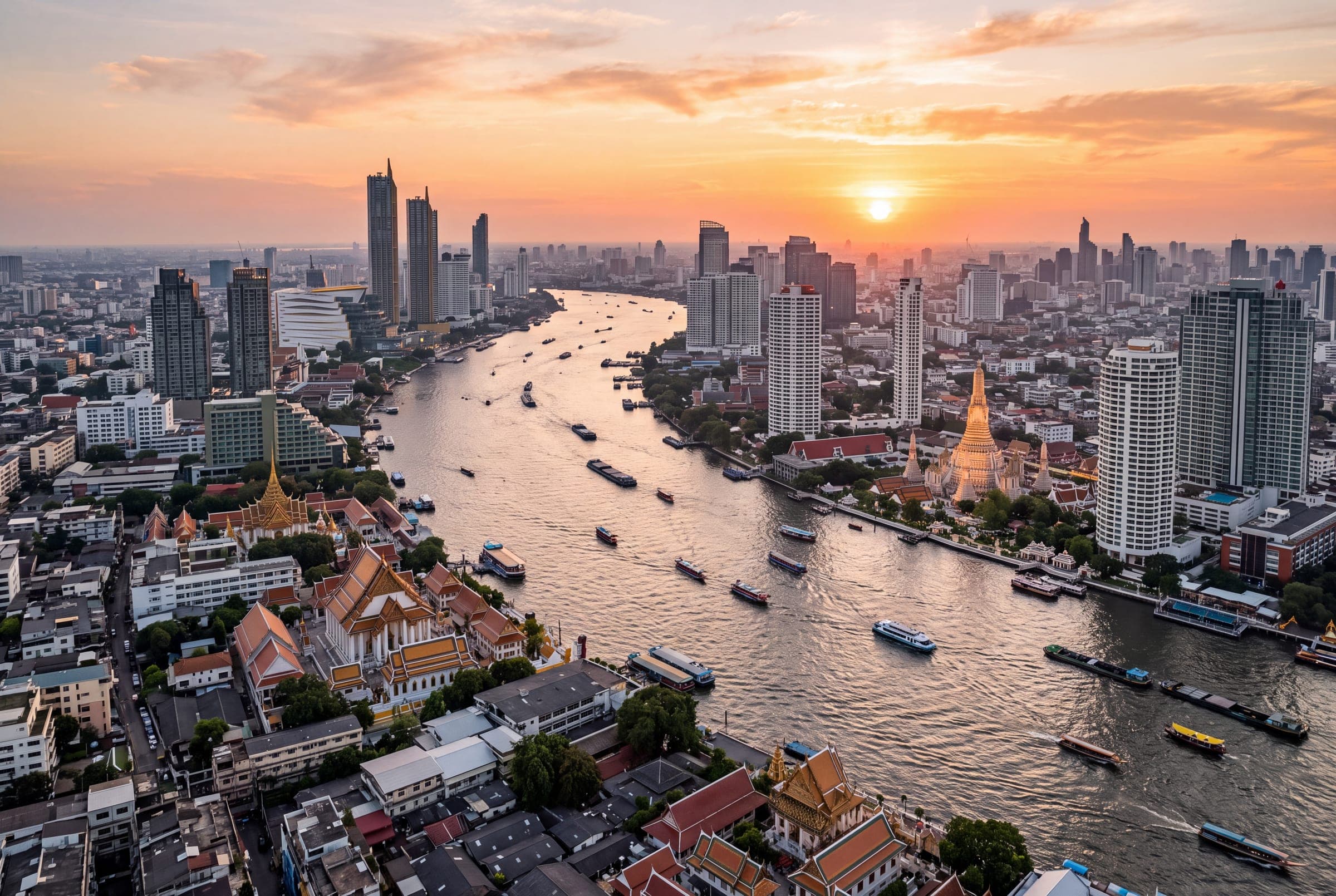 The Bangkok river bend and skyline at sunset
